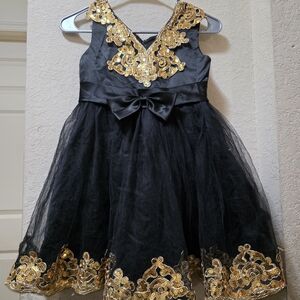 Elegant Black and Gold Dress with Bow